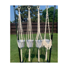 Load image into Gallery viewer, The Golden Collection macrame plant hangers Dorthy, Sophia, Rose and Blanche. All held together at the top with a wooden ring. Each macrame plant hanger uses 100% eco-friendly cotton cord.
